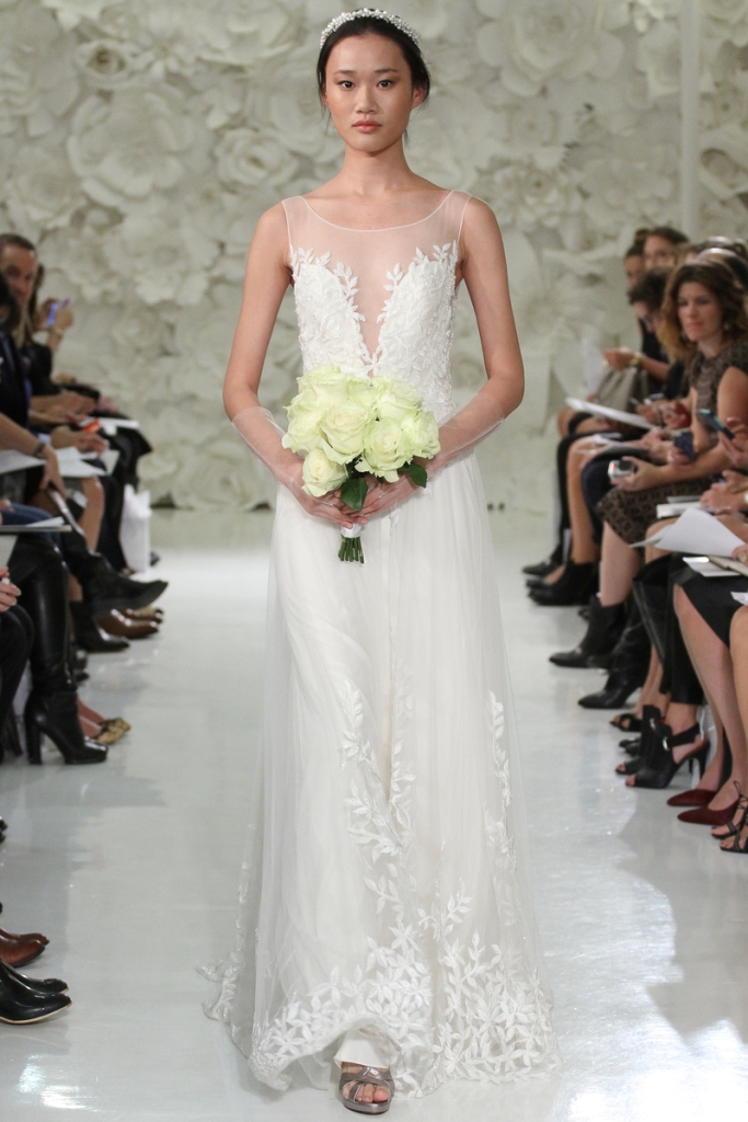 Watters style 7083B Lalai Ivory bridal gown, with A-line skirt, beaded wedding dress with plunging neckline.