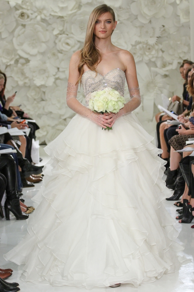 Model walks runway in a Watters Brides gown, by Vatana Watters, for the Watters Spring 2015 bridal fashion, at the Couture Show, during New York Bridal Fashion Week Spring 2015.