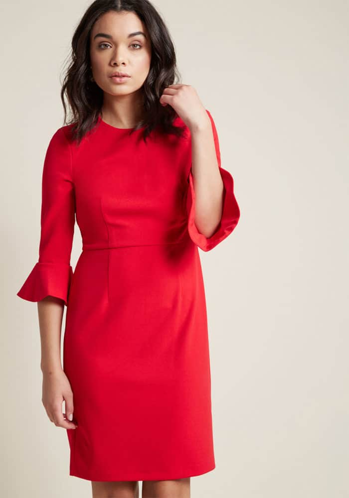 Red holiday dress with ruffled sleeve