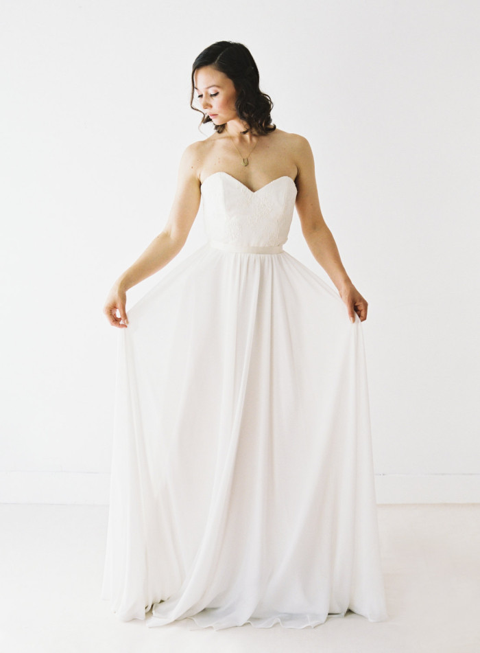 Lace strapless wedding dress by Truvelle