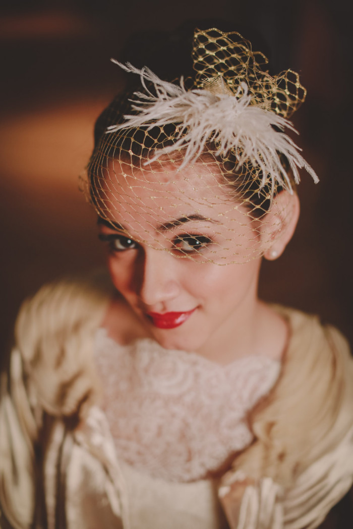 Gold birdcage veil by Hushed Commotion handmade bridal accessories. Photography by Chellise Michael