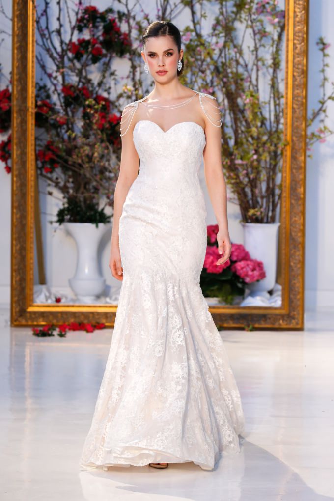 strapless wedding dress by Anne Barge with shoulder jewelry