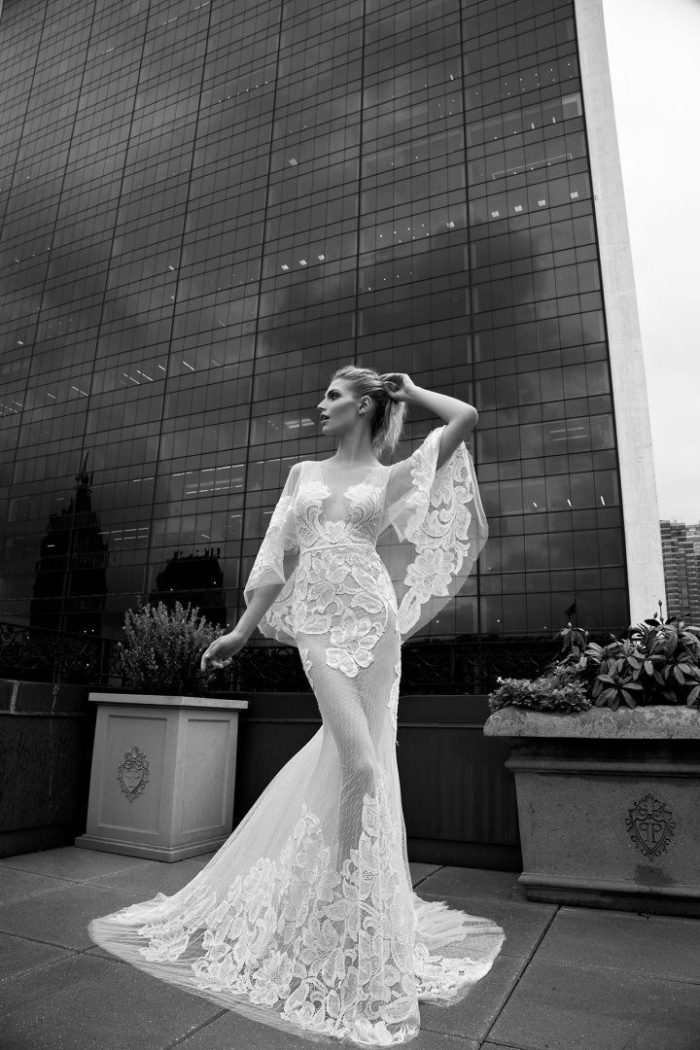 Sheer flutter sleeve couture bridal gown