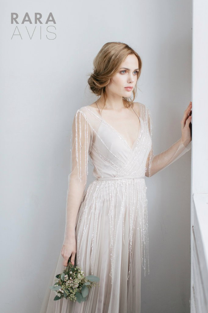 Long sleeve sheer wedding gown by Rara Avis