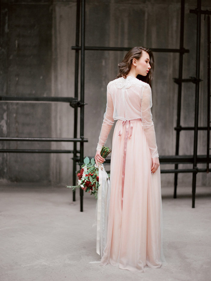 Blush pink long sleeve wedding gown