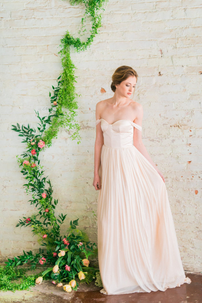 Pale pink wedding dress with off the shoulder straps