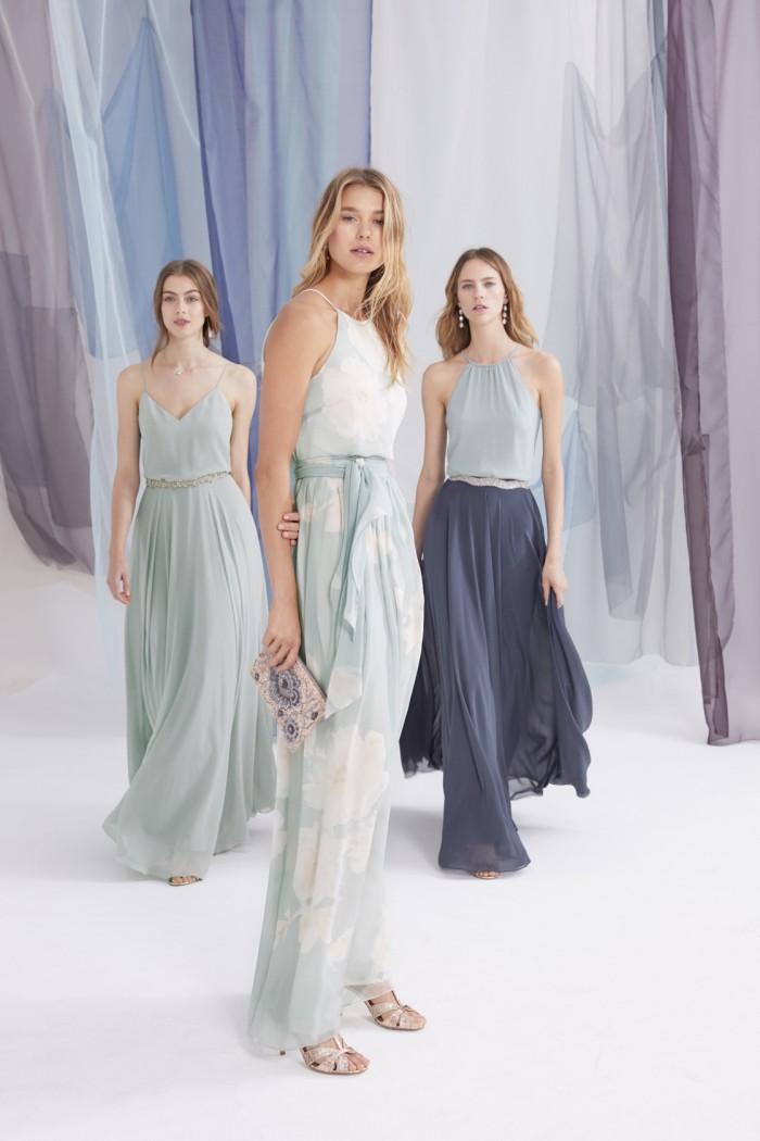 BHLDN Bridesmaid dresses in shades of light blue and dark blue