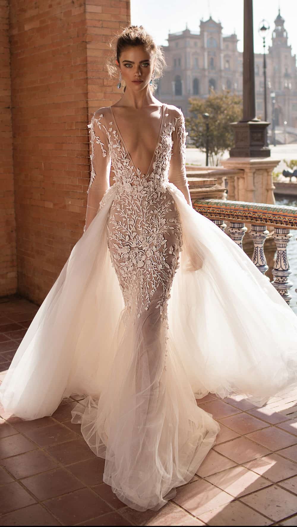 plunging neck wedding dress by Berta Bridal