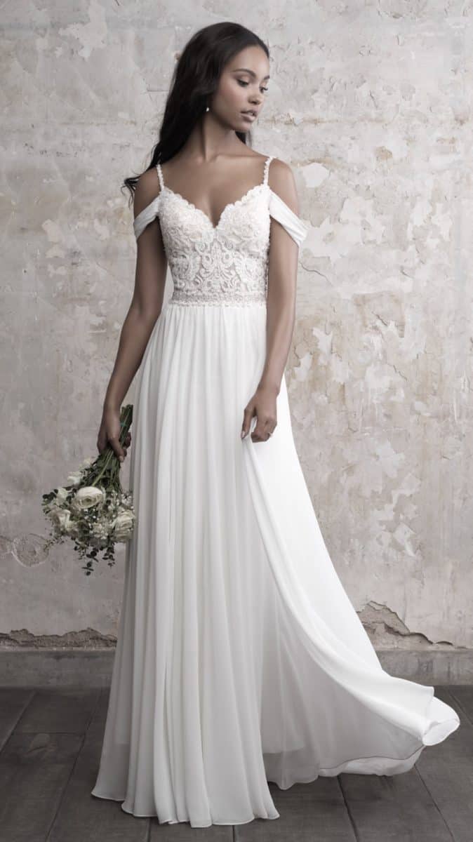 Cold shoulder wedding dress with spaghetti straps by Madison James 