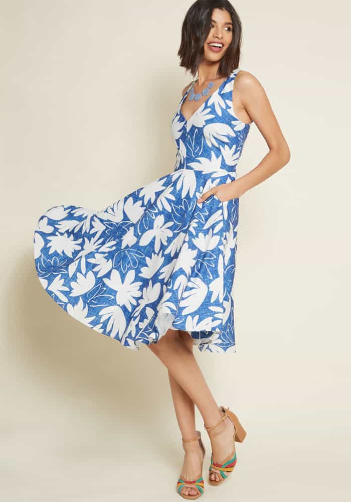 casual dress for august wedding guest blue fit and flare with pockets