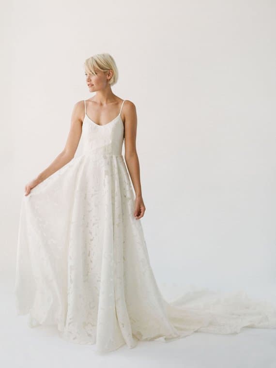 Simple floral lace wedding dress with thin straps and open back | Annie wedding dress by Truvelle