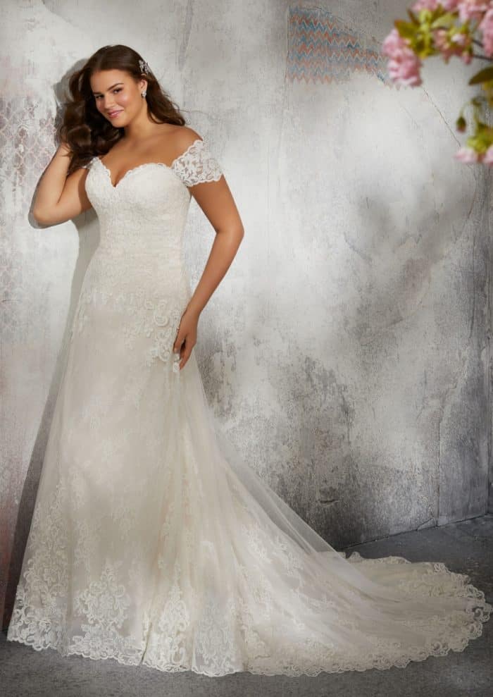 Off the shoulder cap sleeve lace wedding dress in plus sizes