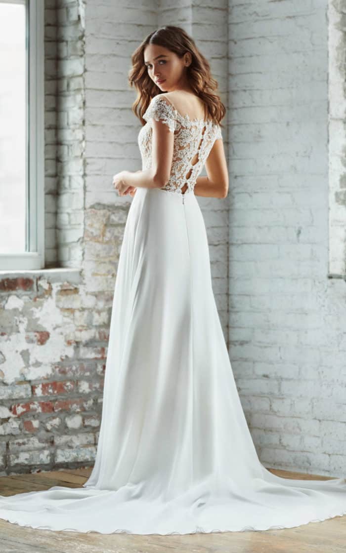 Adeline a sheer lace bodice wedding dress by Ti Adora