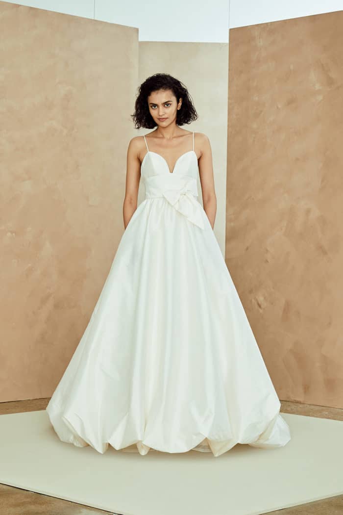 Ballgown wedding dress with a bow and straps Nouvelle Amsale