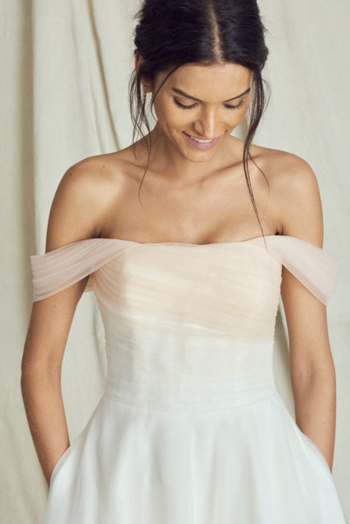 Off the shoulder blush ombre wedding gown by Kelly Faetanini