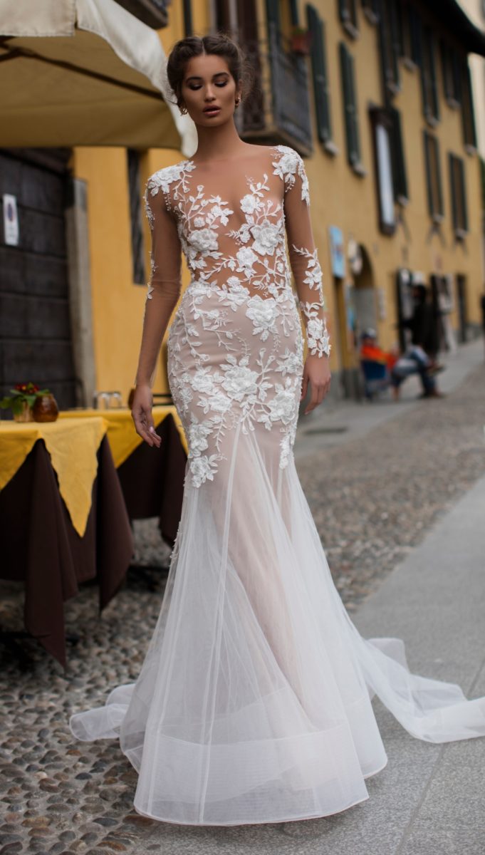 Sheer long sleeve wedding dress with floral appliques