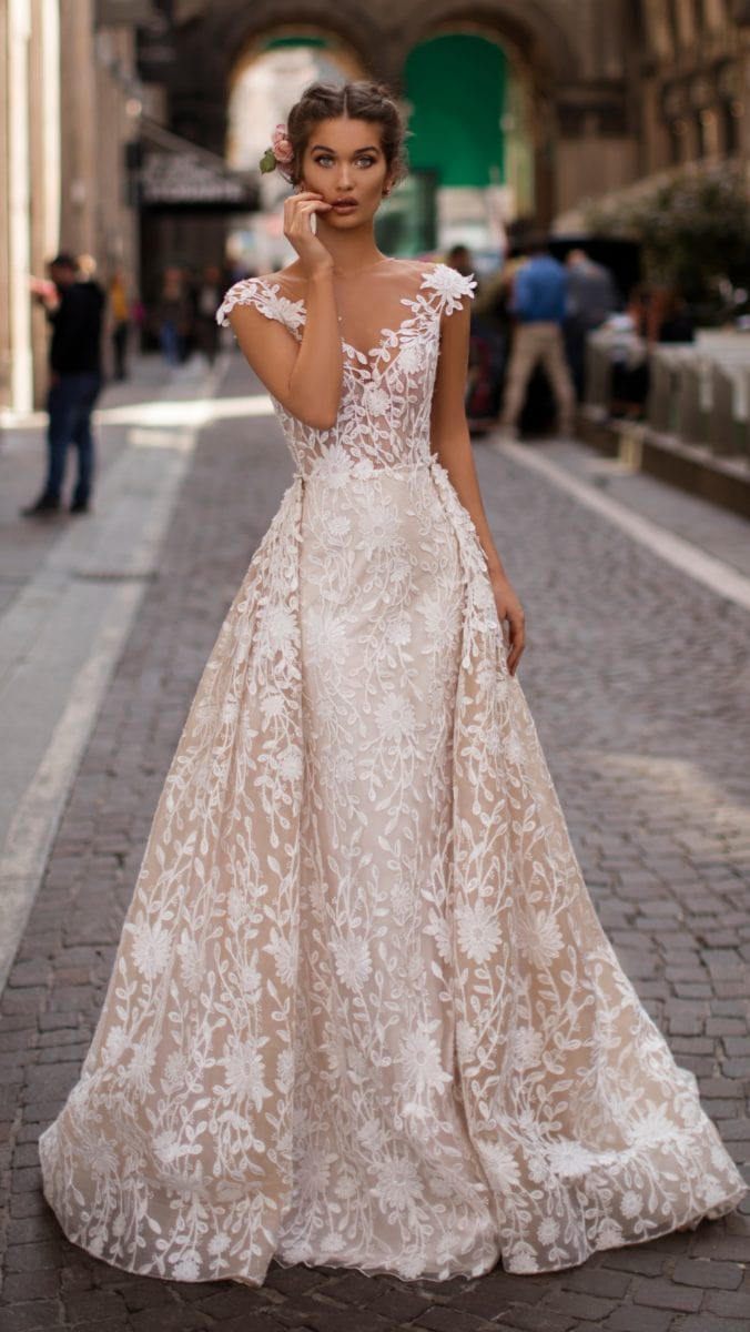 Beautiful lace wedding dress with overskirt