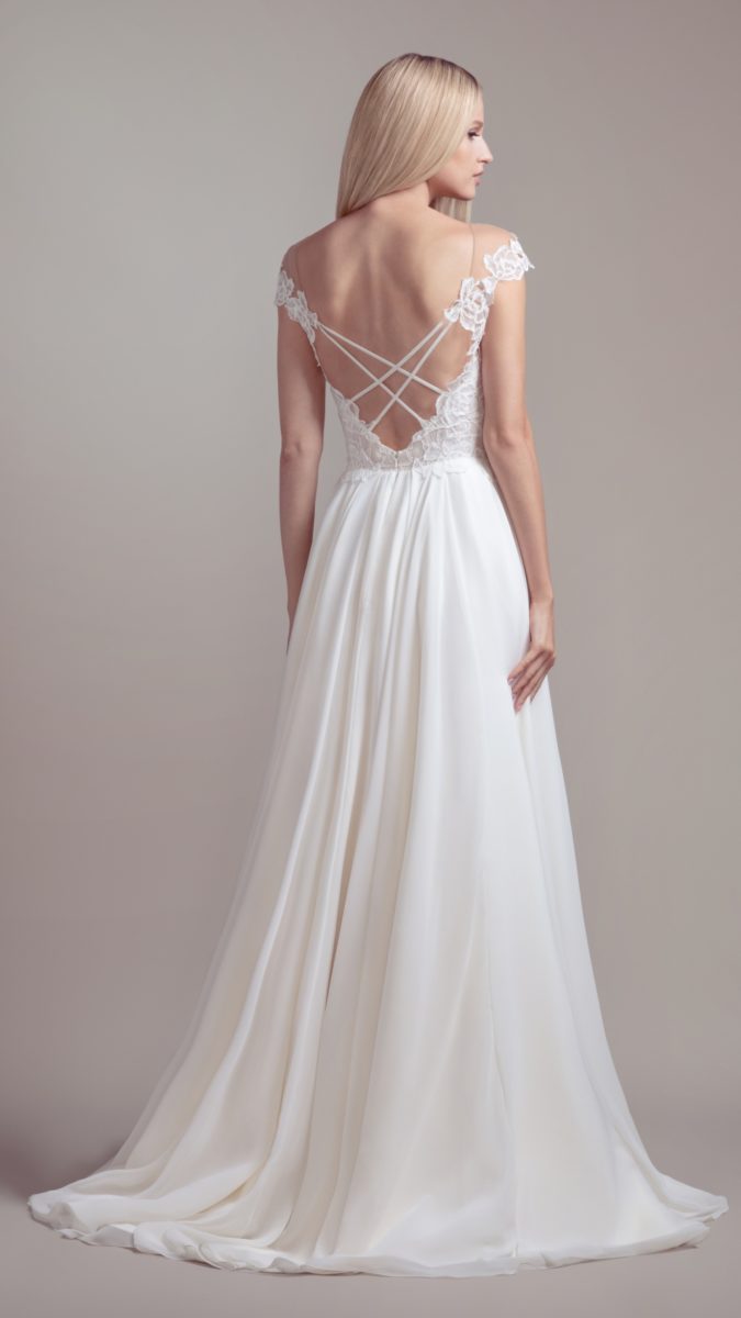 Strappy back wedding dress with cap sleeves