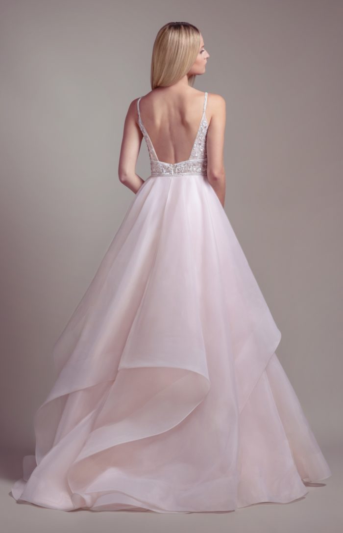 Blush wedding dress with tulle and organza ball gown and beaded bodice 