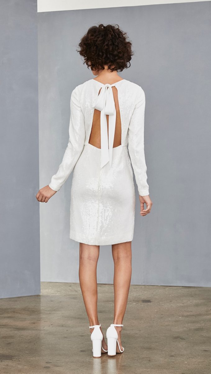 Bow back white sequin shift dress with long sleeves | Amsale Little White Dress Collection