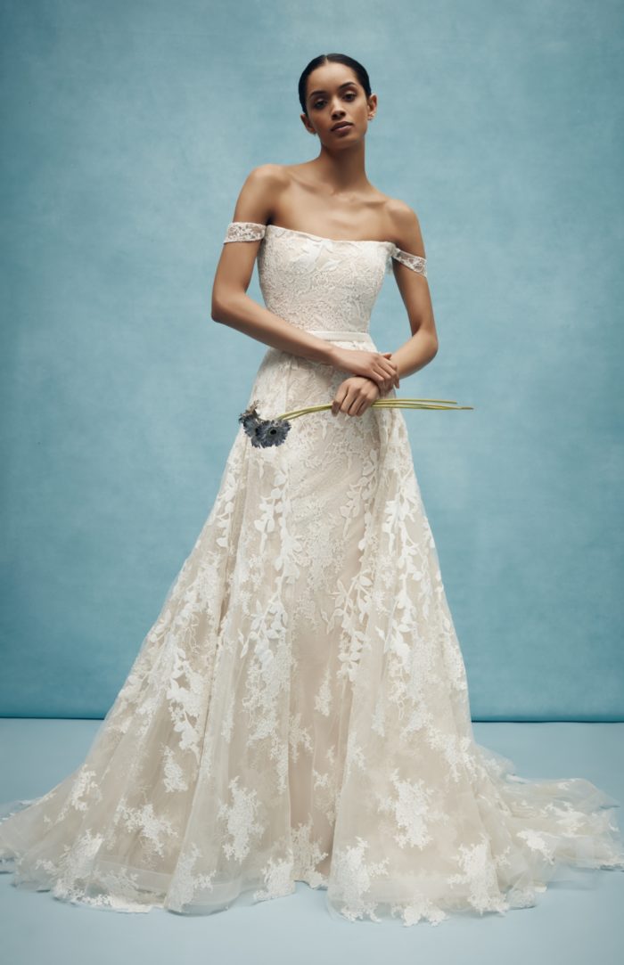 Ivory lace wedding dress with overskirt by Anne Barge