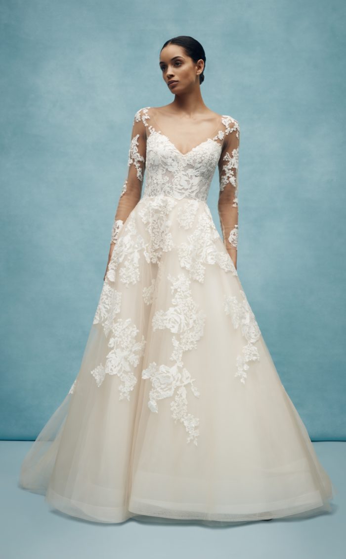 Long sleeve wedding dress with tulle skirt