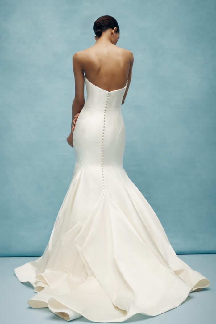 Sleek strapless wedding dress with buttons up the back