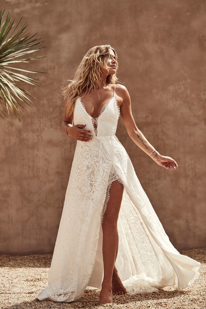 Sexy lace plunge neck spaghetti strap bridal gown with leg slit