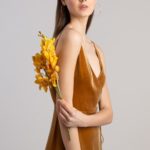 Golden spaghetti strap velvet gown