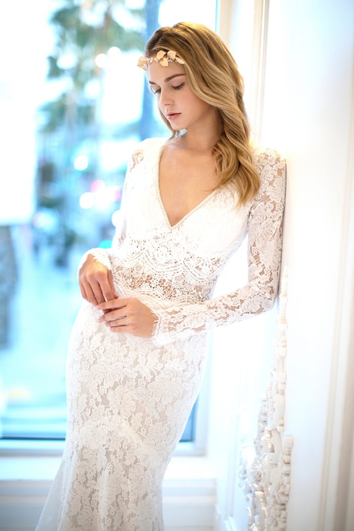 Long sleeve lace wedding dress with v neck by Winnie Couture