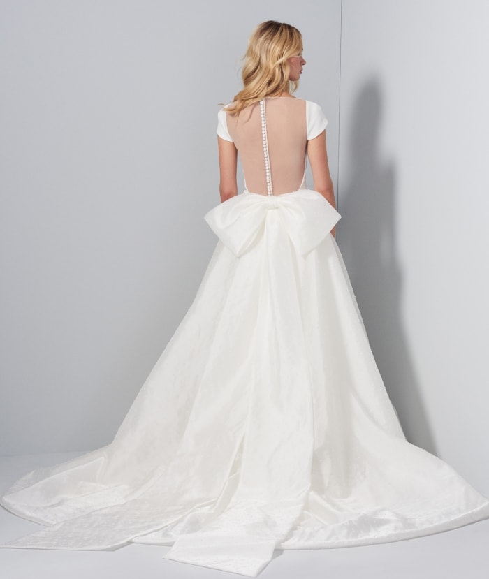 Back detail of Aimee Gown with bow overskirt