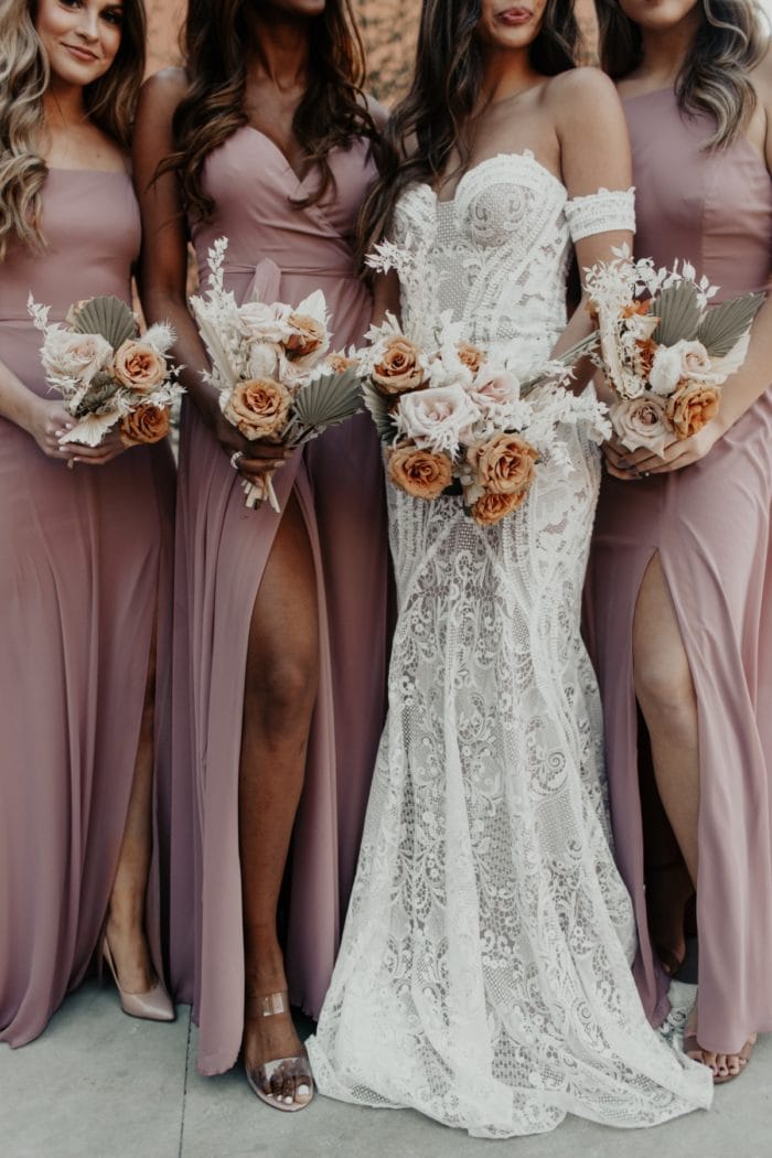 Flowers and Mauve Dresses for Bridesmaids from Dessy