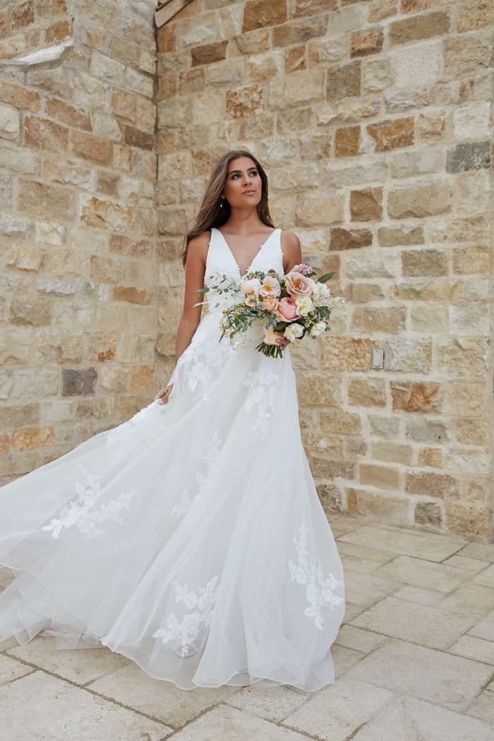 Floaty wedding dress with V neck