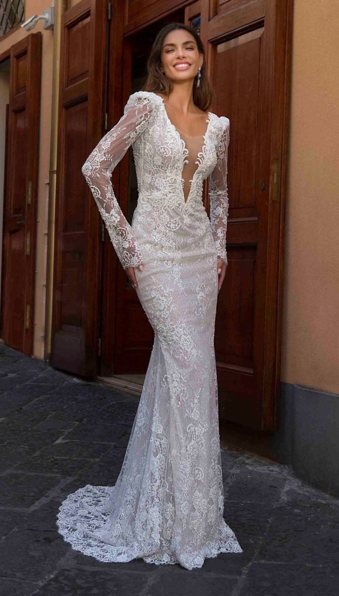 Long sleeve lace wedding dress with deep plunging neck