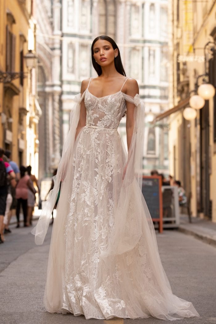 Lace and tulle designer wedding dress with long tulle shoulder streamers