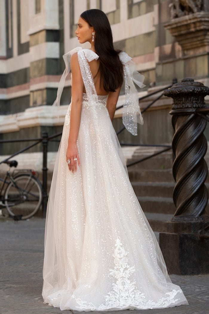 Back detail of Faith gown with bows and train