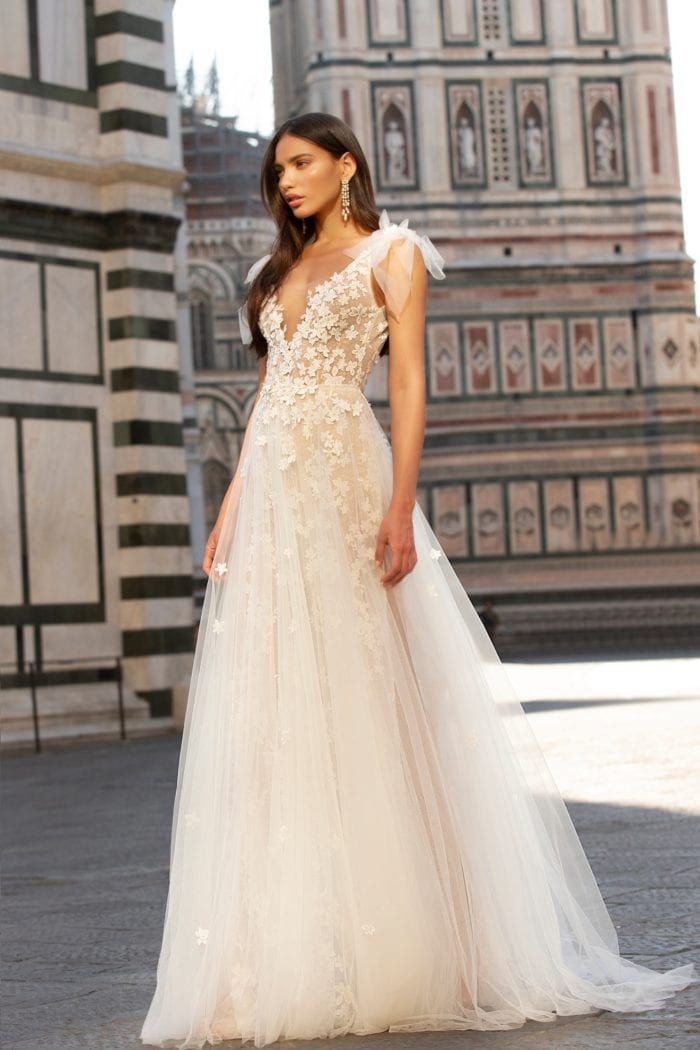 Tulle and floral detailed plunge neck designer wedding dress