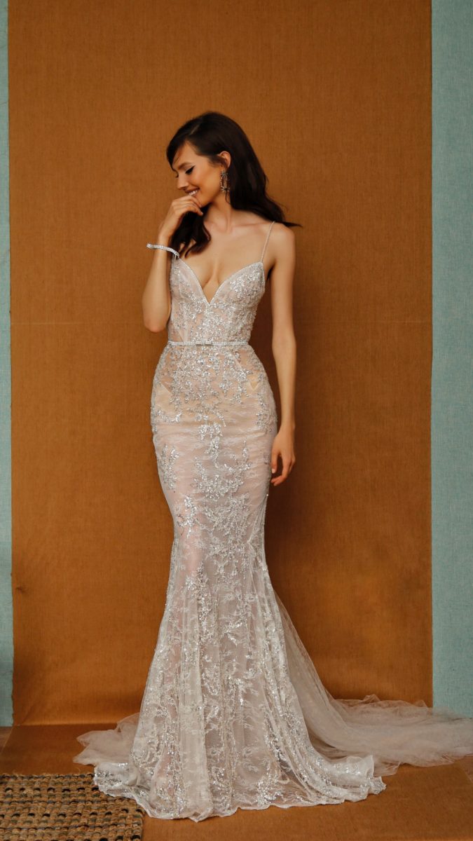 Fitted strapless nude bridal gown plunge neckline