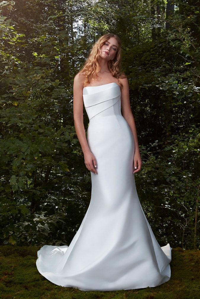 Modern strapless wedding dress with pleatd bodice and mermaid hem