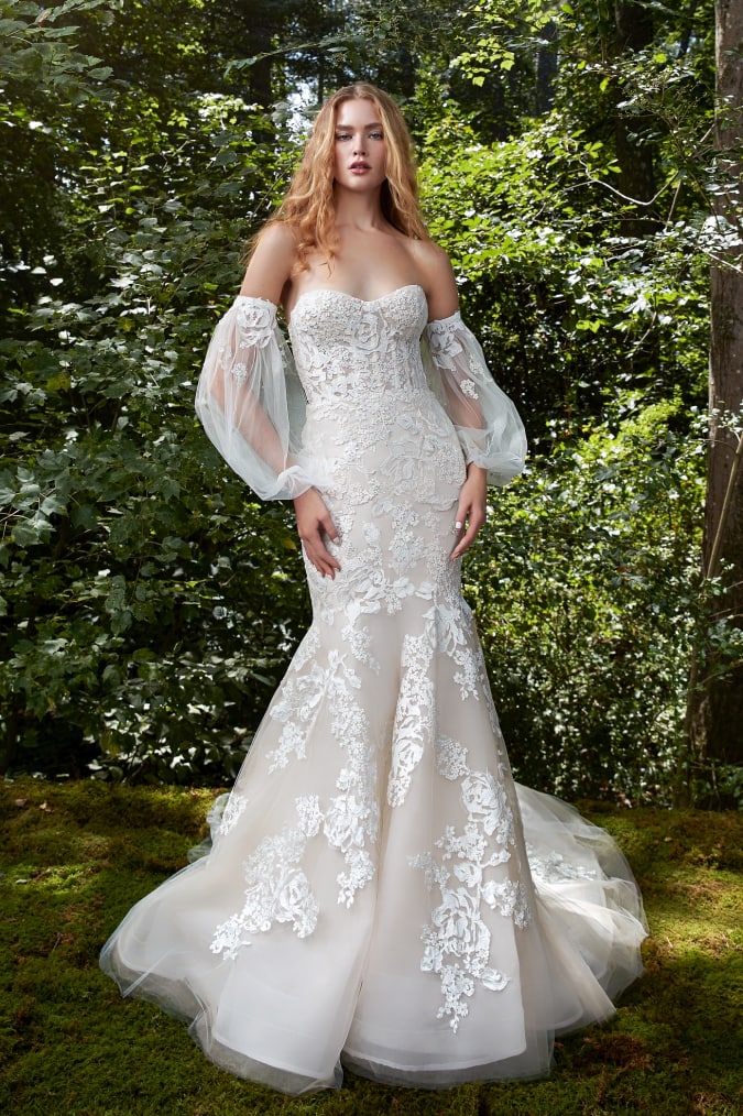 Strapless bridal gown with option of detachablepuff sleeves