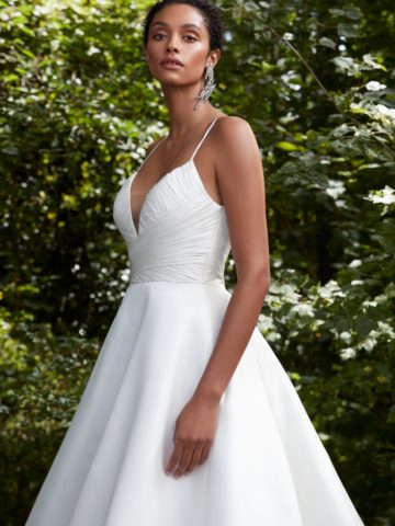 Spaghetti strap ballgown wedding dress with deep v neckline