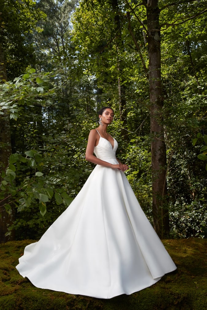 grand ballgown wedding dress with modern v neck bodice and spaghetti straps by Anne Barge