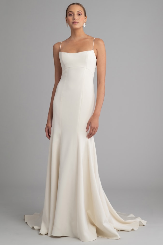 Modern minimalist ivory wedding gown with thin straps