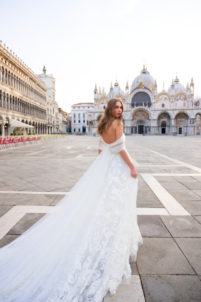 Wedding dress with off the shoulder shrug