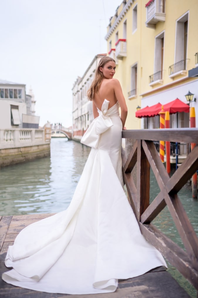 Strapless bridal gown with bow back