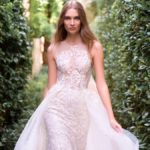 Embellished lace wedding dress with overskirt