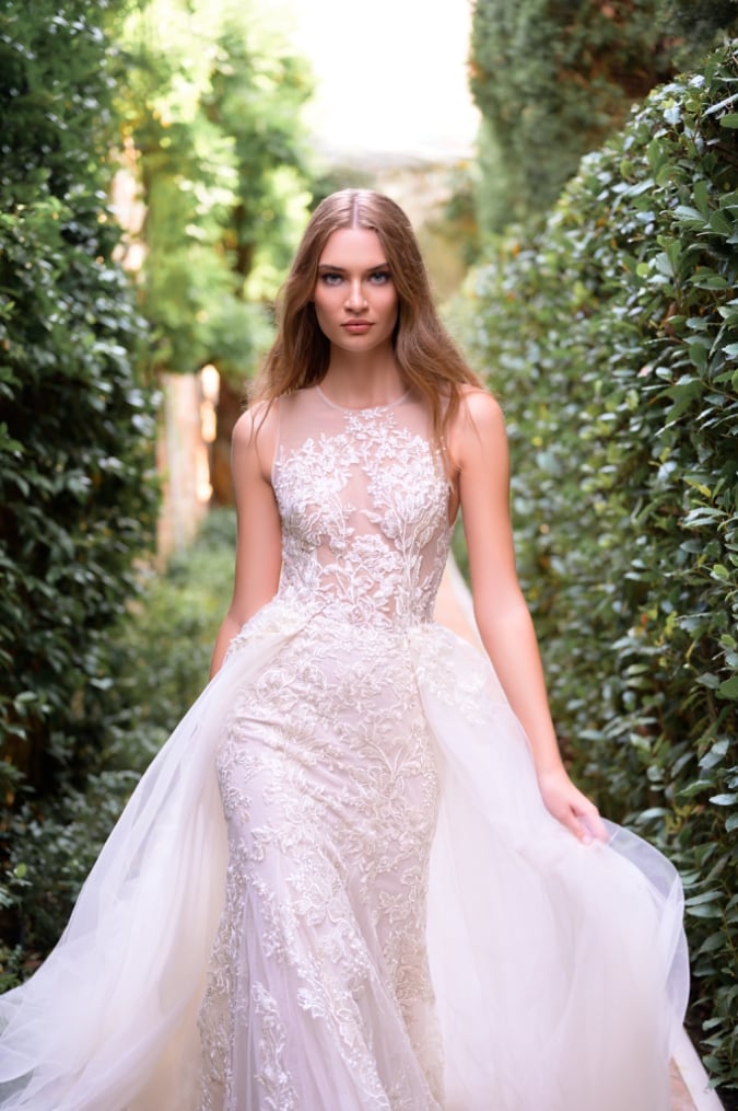 Embellished lace wedding dress with overskirt