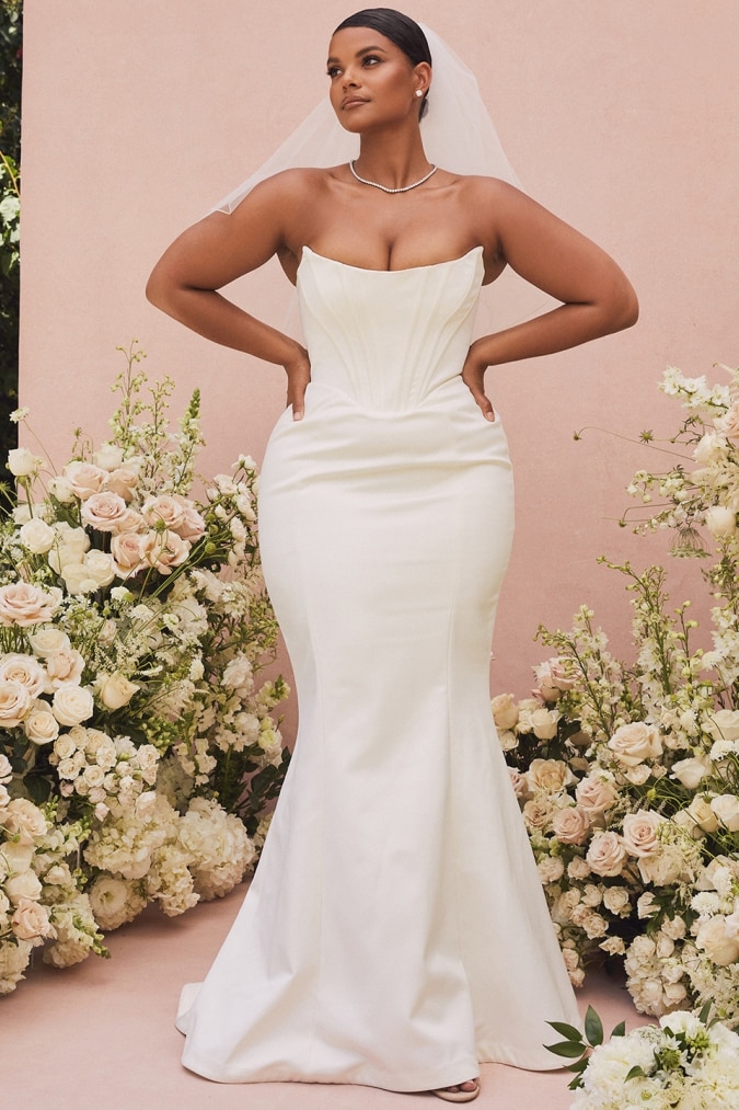 Plus size strapless wedding dress with corset and mermaid hem