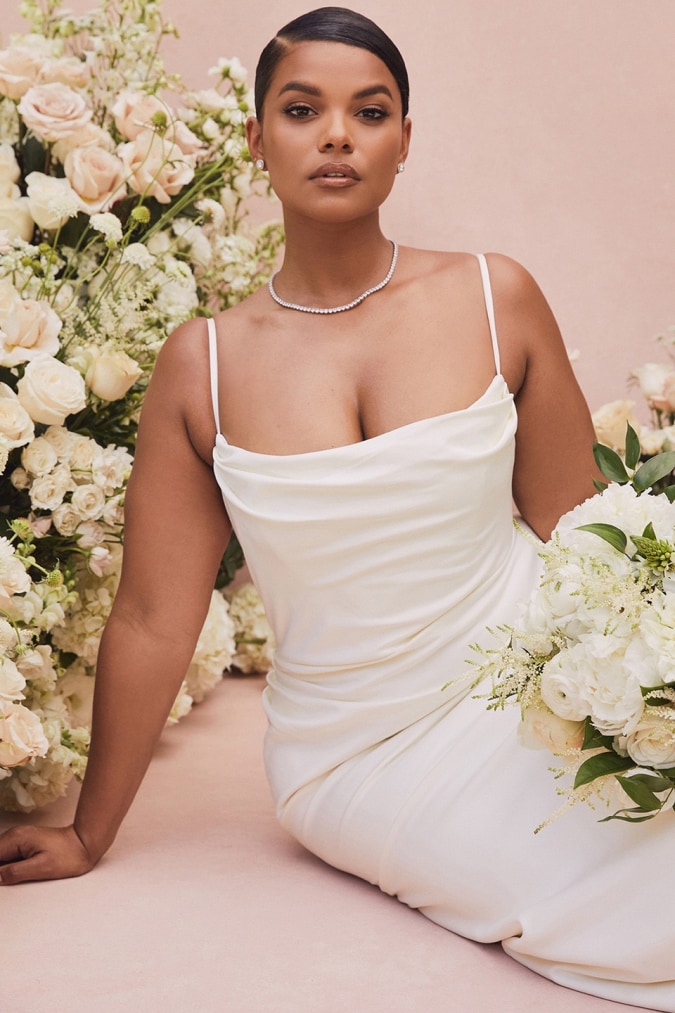 Draped ivory plus size wedding dress with spaghetti straps