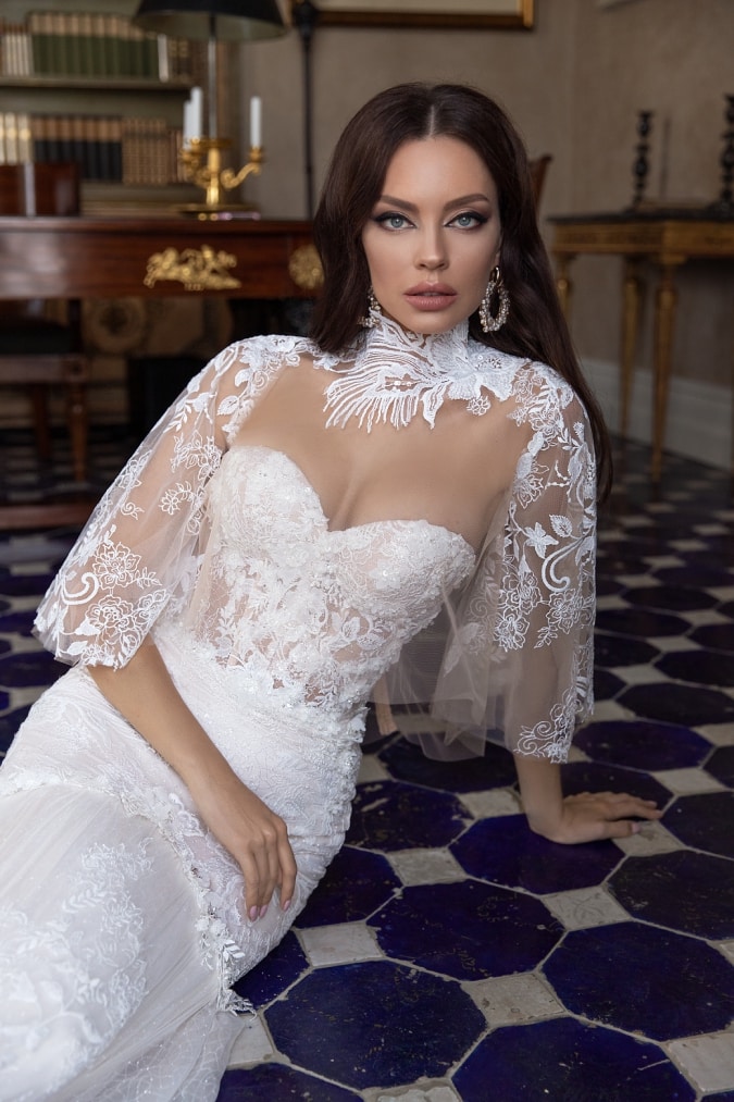 Wedding dress with lace cape